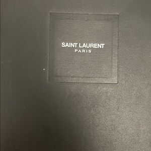 Saint Laurent leather sneakers with flowers. Absolutely adorable!